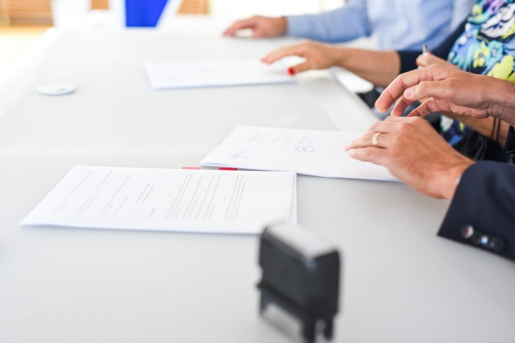 agreement, contract signing, table, hands, sign, contract, paper, paper work, meeting, business, closeup, agreement, contract, contract, contract, contract, contract